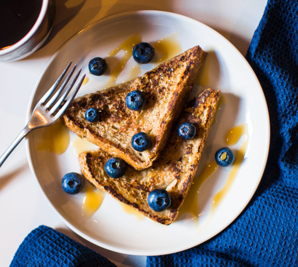 french toast with blueberries on a plate